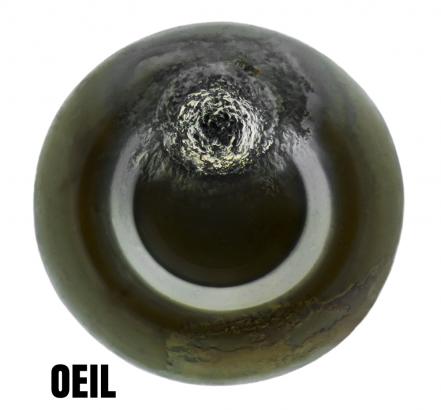 Le mot "Oeil" associé à une micrométéorite photographiée par Jon Larsen