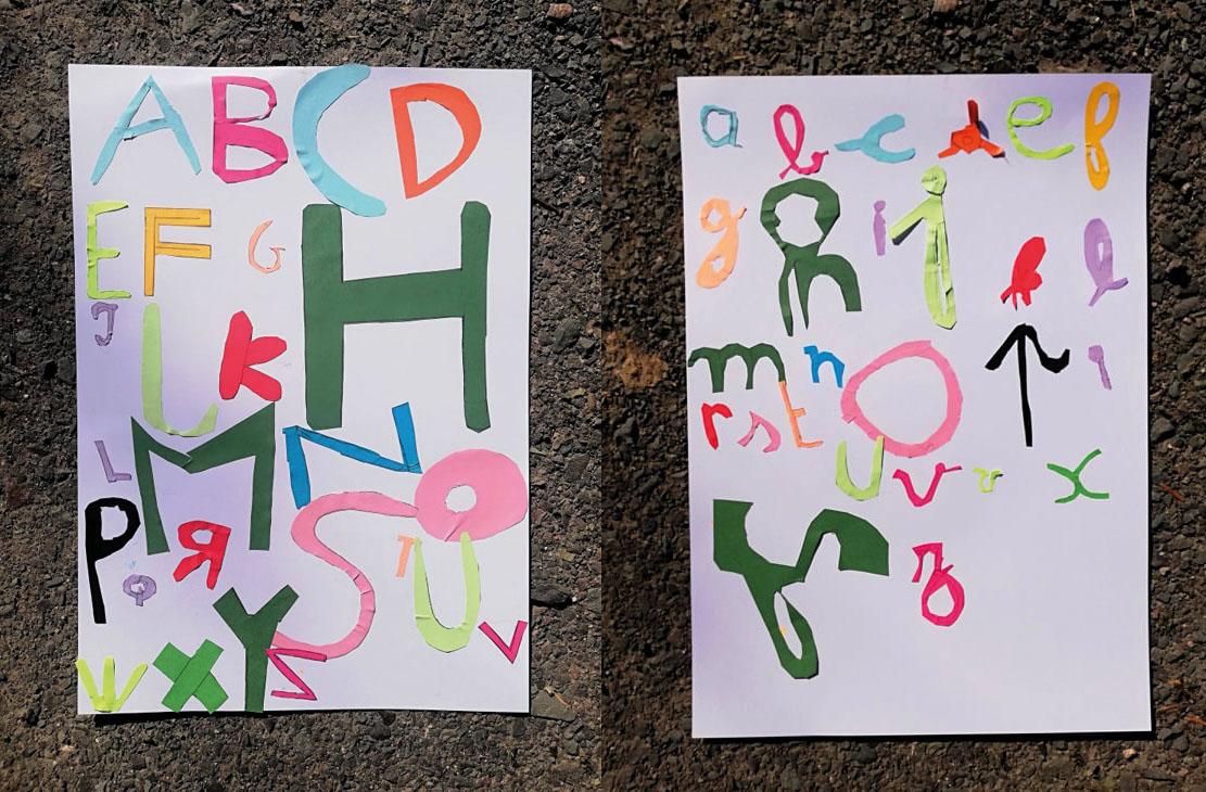 Typographie réalisée par les enfants en papiers découpés.